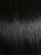 Magic Page in Espresso Mix shade by Gisela Mayer, side profile highlighting the clean short bob cut and elegant silhouette.