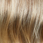 Alea in Champagne Rooted by Gisela Mayer, side view showing the soft champagne blonde on the long natural-looking wig.