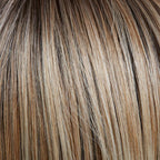 Gisela Mayer Next in auburn shade, front view showing the warm red tone on the mid-length bob wig.