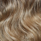 Nuba by Gisela Mayer, rear view showing the full long curly length and natural-looking voluminous finish.