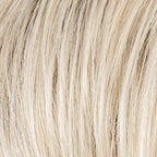 Sparkle Deluxe in Light Champagne by Ellen Wille, side view displaying the delicate champagne blonde on the long wavy synthetic wig.