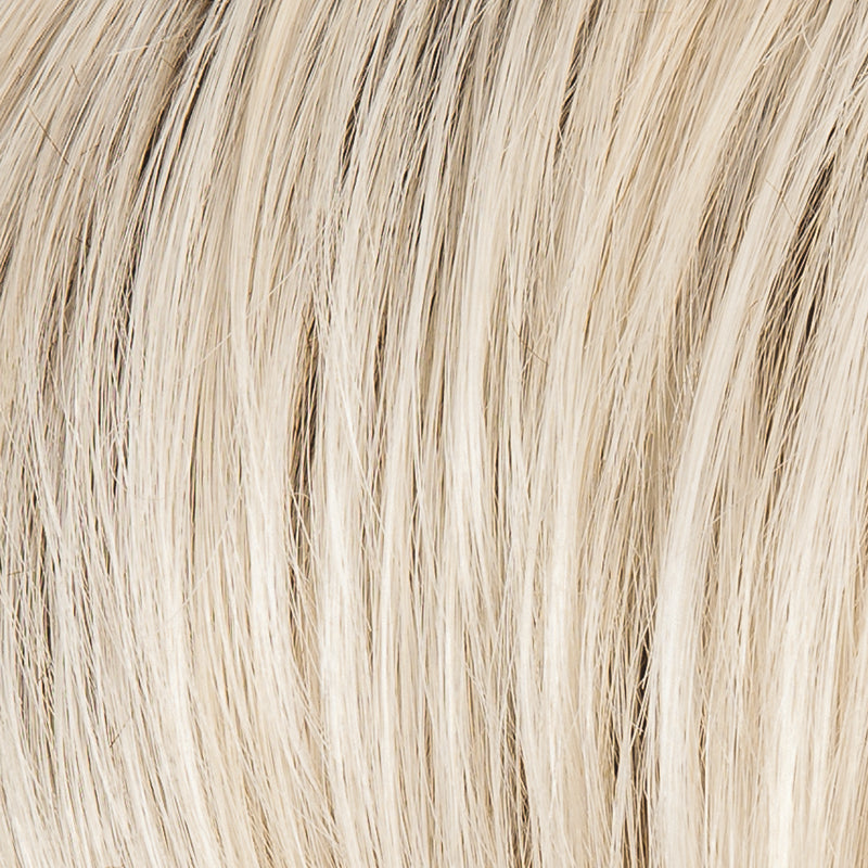 Sparkle Deluxe in Light Champagne by Ellen Wille, side view displaying the delicate champagne blonde on the long wavy synthetic wig.