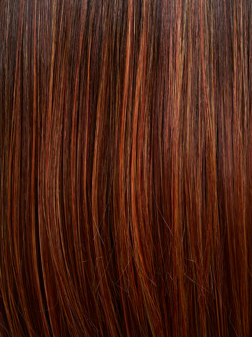Magic Fresh in Hot Flame by Gisela Mayer, three-quarter angle displaying the bold warm tones on the structured short synthetic wig.