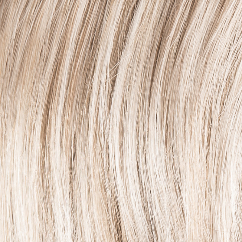 Ellen Wille Posh Deluxe in Pearl, three-quarter angle showing the delicate pearl tone on the modern short synthetic wig.