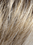 Gisela Mayer Magic Rock in Stone Grey, side profile displaying the modern grey tones on the mid-length heat-resistant synthetic wig.