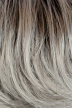 Gisela Mayer Magic Fresh in Light Grey Rooted, side view showing the contemporary grey shade on the modern short cut wig.
