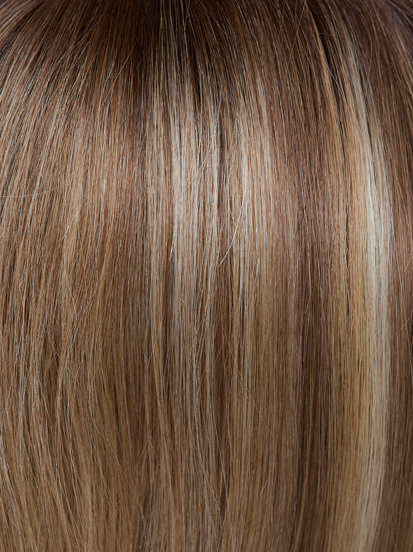 Gisela Mayer Euro Coco Deluxe, three-quarter view showing the elegant mid-length silhouette and silky natural hair texture.