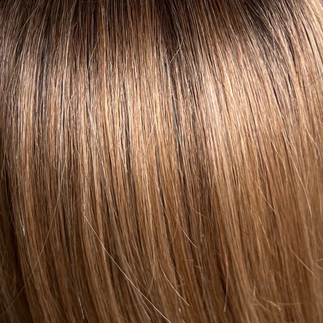 Supreme Moda by Gisela Mayer in blonde shade, front view showing the light blonde on the long semi-natural wig.