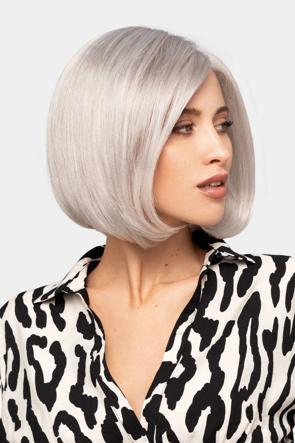 High End Page Large wig by Gisela Mayer, side view showing the mid-length sleek bob and large cap construction.