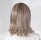 Ellen Wille Whisper Comfort, three-quarter view showing the shoulder-length silhouette and elegant side piece.