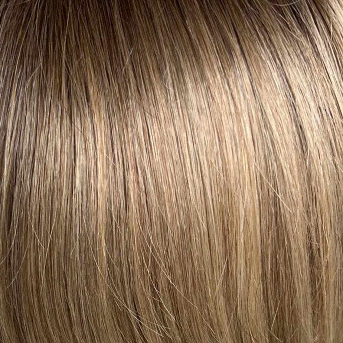 Gisela Mayer Supreme Moda in warm shade, side profile showing the natural-looking tone on the long semi-natural wig.