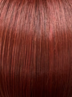 Magic Spicy in Chestnut Mix by Gisela Mayer, three-quarter view showing the rich warm tones on the structured mid-length synthetic wig.