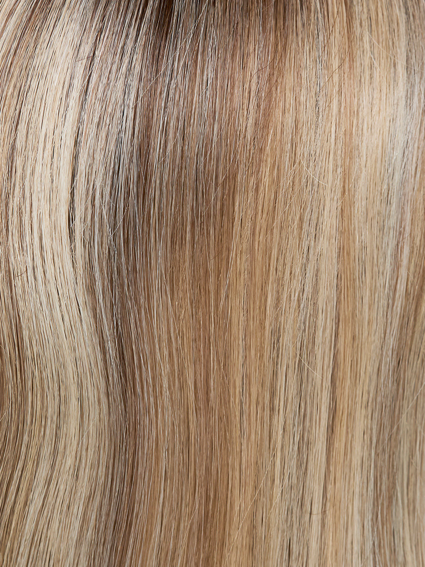 Gisela Mayer Euro Mora in Natural Sand Rooted, front-facing view showing the sandy natural tone on the long human hair wig.