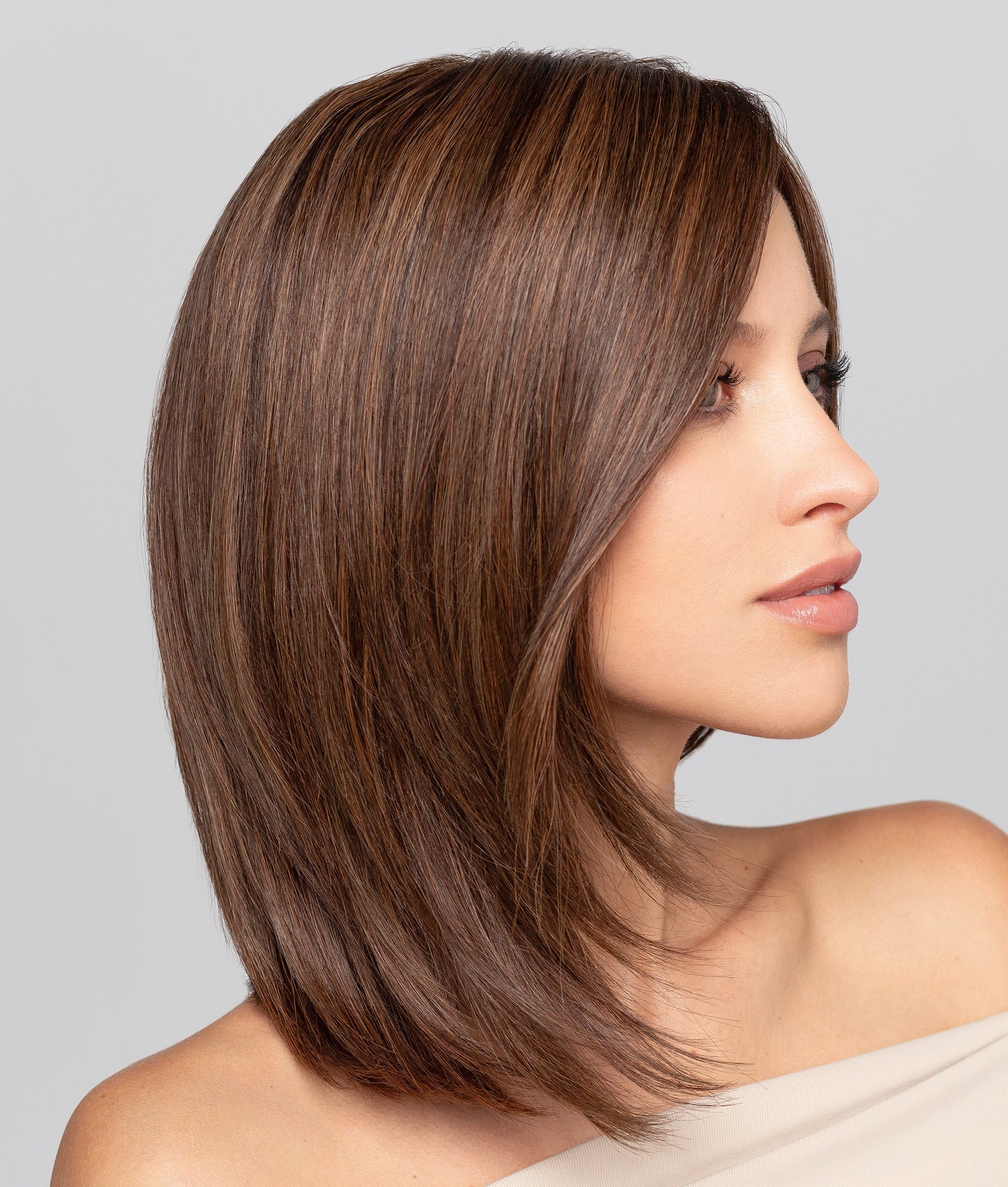 Prime Age Lace wig by Gisela Mayer, side view showing the mid-length Remy hair and supple, elegant drape.