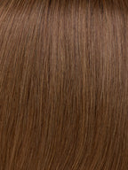 Gisela Mayer Prime Call Lace, profile view showing the mid-length cut and natural hair movement.