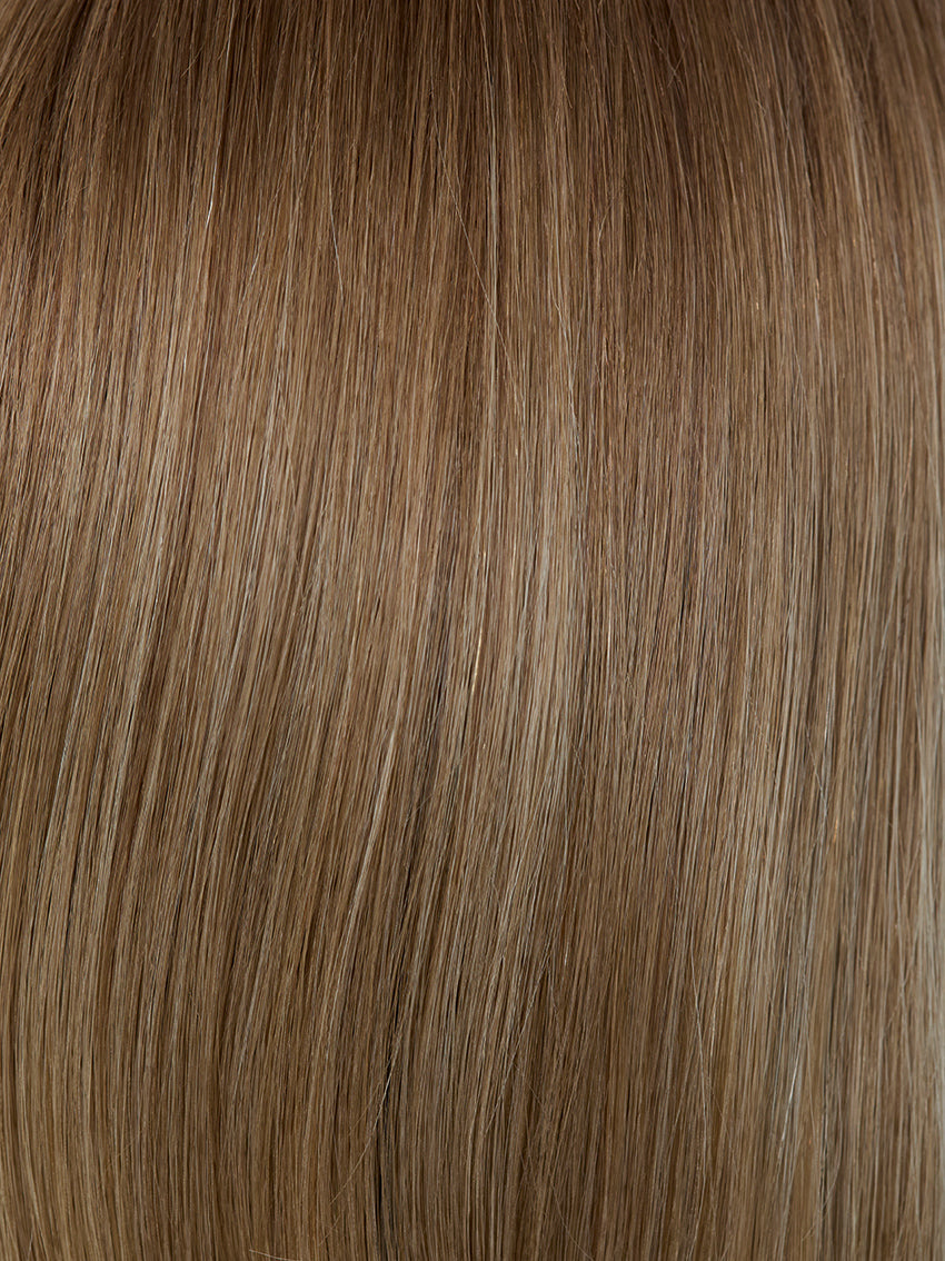 Gisela Mayer HH Remy Super Curl, profile view showing the long curly silhouette and realistic scalp appearance.