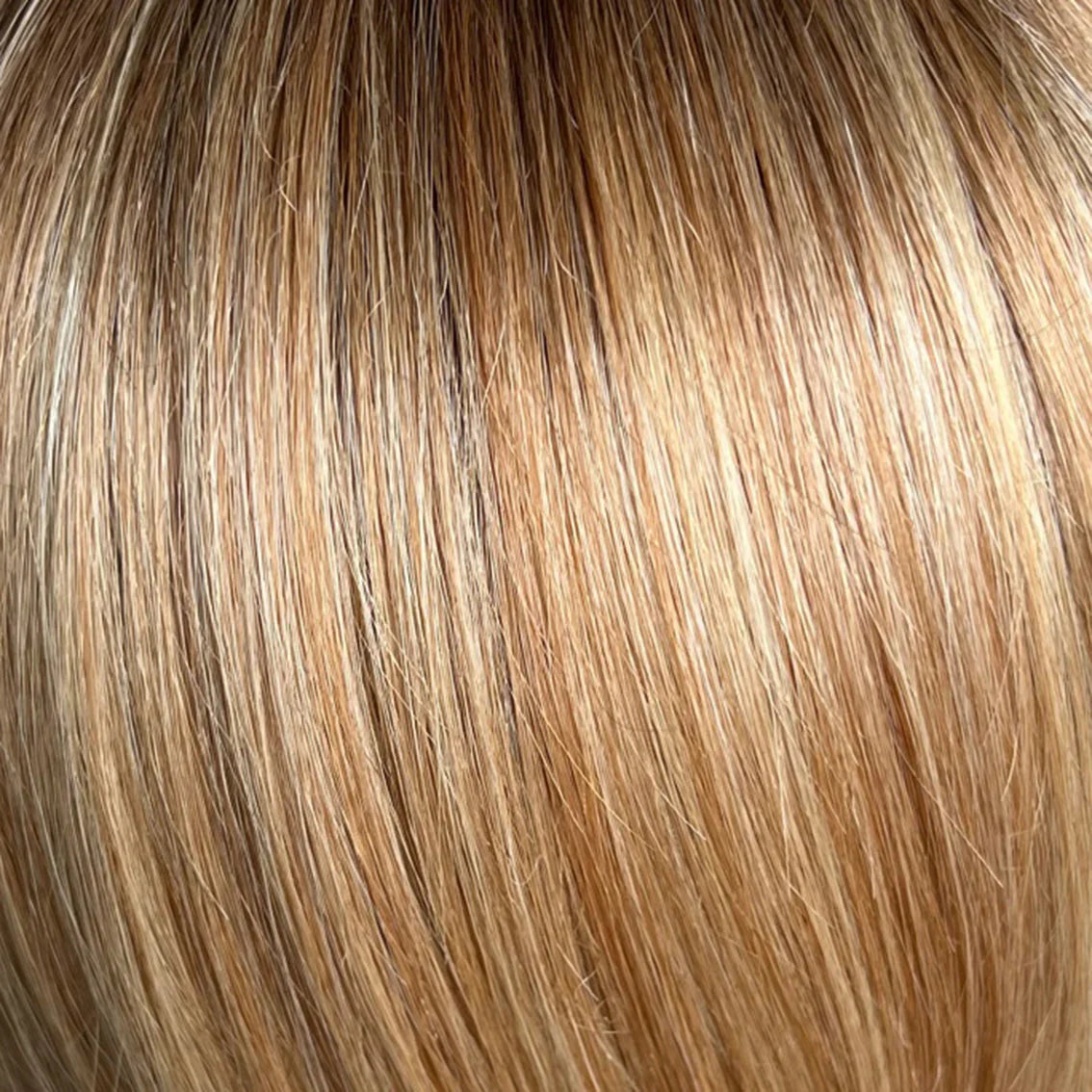 Gisela Mayer Supreme Moda, rear view showing the full long length and smooth refined finish of the semi-natural wig.