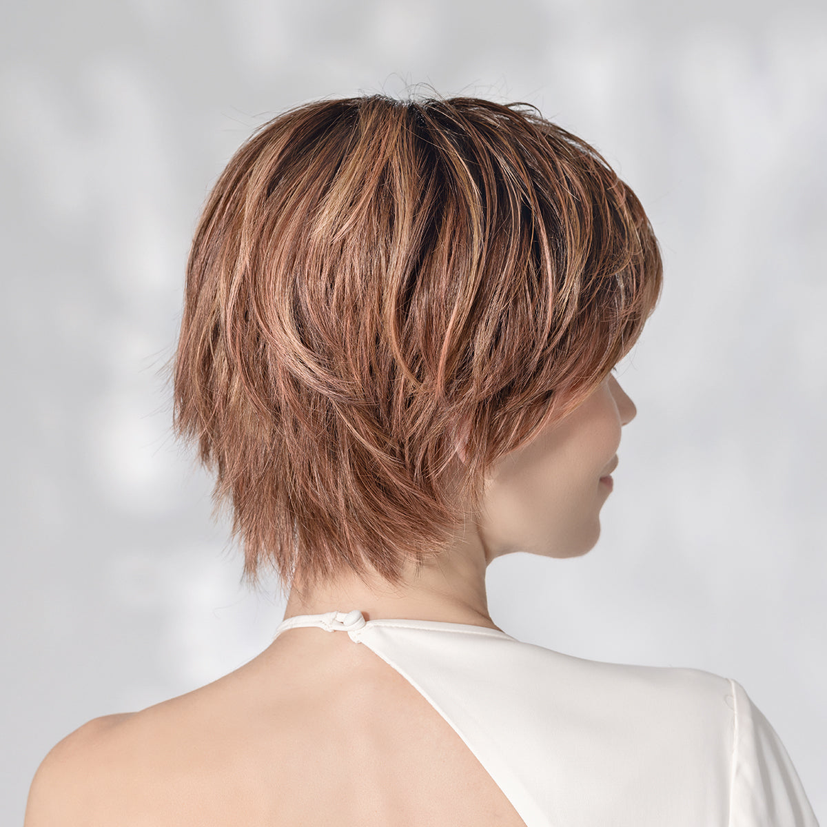 Ellen Wille Avenue Soft in Rosewood Rooted, three-quarter view showing the graduated back and elegant side piece.