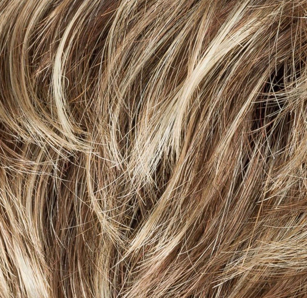 Keira in Bernstein Rooted by Ellen Wille, three-quarter view showing the warm golden tone on the short modern wig.