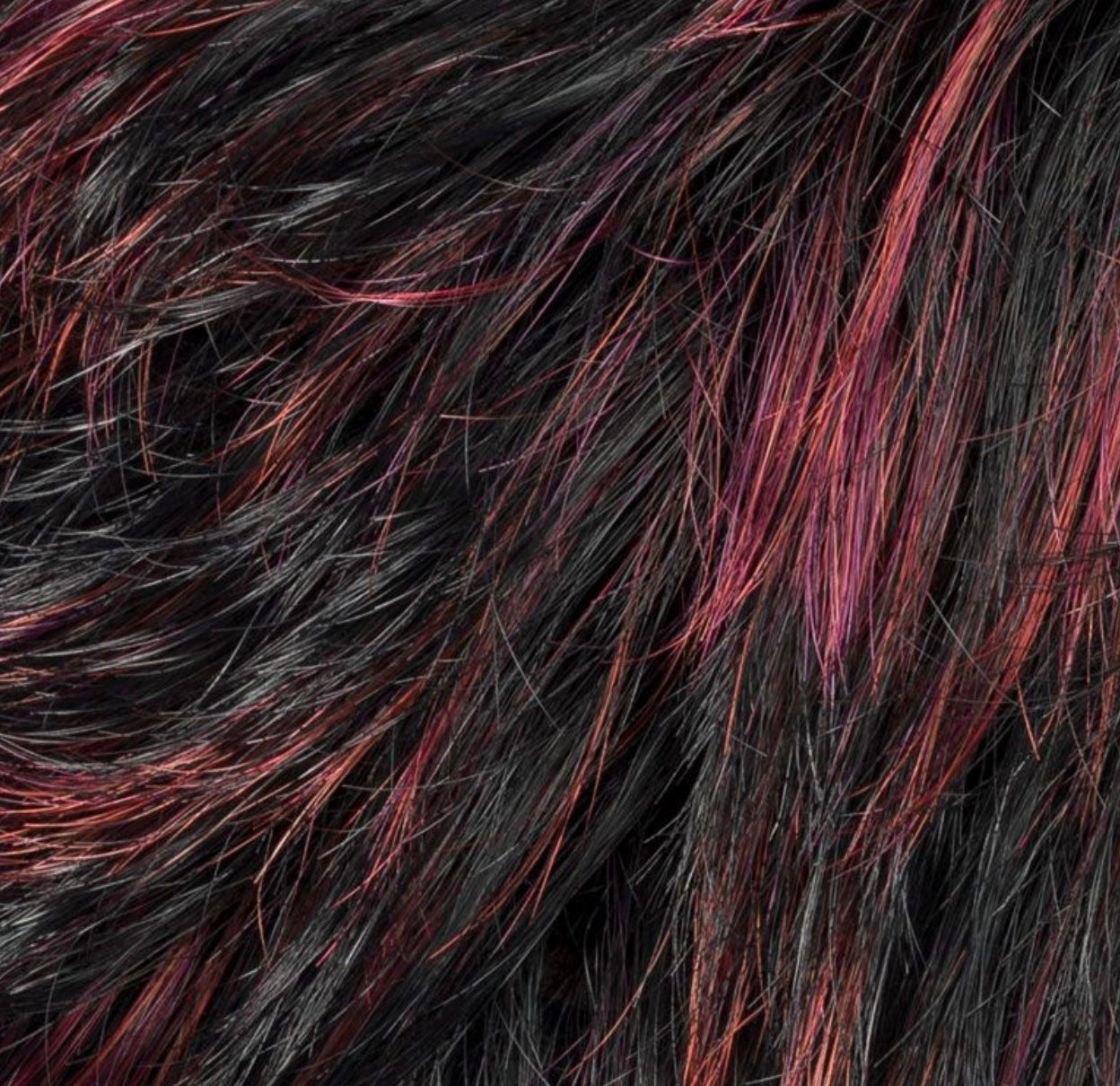 Ellen Wille Keira in Black Aubergine Mix, side profile showing the dark aubergine tone on the short feathered synthetic wig.