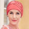 Le bonnet chimio Ankaa Corail maintient votre cuir chevelu à 37,5 °C, idéal pour sport ou randonnées, léger et confortable.