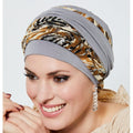 Sublimez votre style avec ce bonnet chic doté de deux bandeaux amovibles. Plissé, il offre un effet matière élégant et pratique.