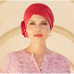 Le bonnet Zuri Coton Elite Hair, doux et résistant, protège le cuir chevelu sensible et masque parfaitement une pelade ou perte de cheveux due à une chimio.