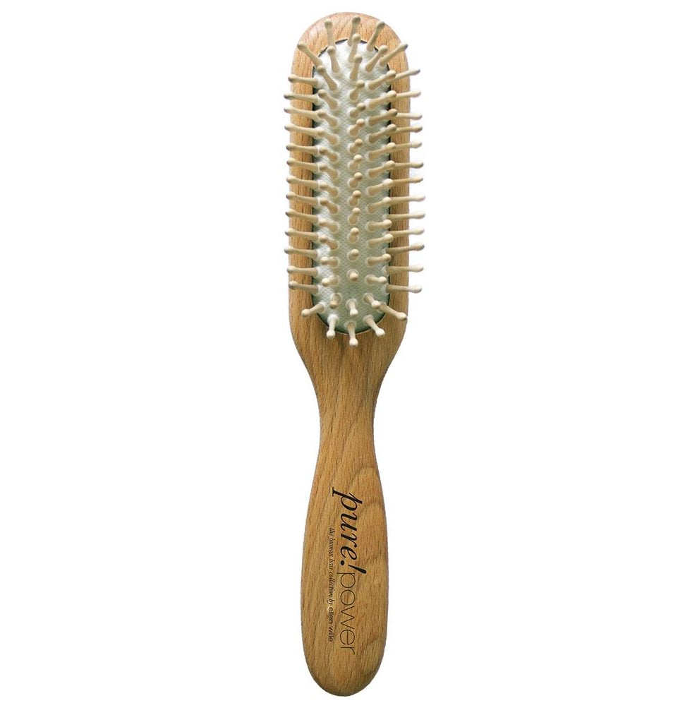 Brosse Purepower, idéale pour démêler et coiffer vos perruques femme en cheveux naturels sans abîmer les fibres.
