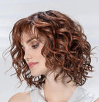 Eclat Deluxe wig by Ellen Wille, lifestyle side view showing the mid-length style and heat-resistant synthetic fiber.