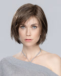 Front view of a woman wearing the Ellen Wille Amy Small Deluxe wig, showcasing its petite short bob cut, tapered ends, and side-swept fringe.