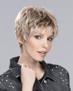 Profile view of a woman wearing the Ellen Wille Bo Mono ultra-short pixie wig, showing the tapered crown and natural volume at the back.