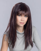 Front view of a woman wearing the long, sleek, and perfectly straight Ellen Wille Cher synthetic wig.