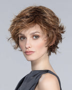 Front view of a woman wearing the Ellen Wille Date Mono short wig, highlighting its natural monofilament parting, lace front hairline, and textured pixie layers.