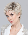 Front view of a woman wearing the classic Ellen Wille Foxy Mono short wig, showcasing its natural monofilament parting and subtle cropped pixie layers.