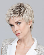 Front view of a woman wearing the classic Ellen Wille Foxy Mono short wig, showcasing its natural monofilament parting and subtle cropped pixie layers.
