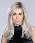 Front view of a woman wearing the long Ellen Wille Music Comfort wig, highlighting its tapered face-framing layers, natural fluid movement, and premium cap.
