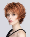 A woman modeling the short Ellen Wille Sky wig, highlighting its dynamic tapered layers, modern tousled messy-hair styling, and youthful silhouette.
