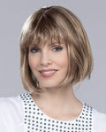 Front view of a woman modeling the Ellen Wille Sue Mono wig, showcasing its classic straight bob cut, blunt front bangs, and realistic monofilament top.