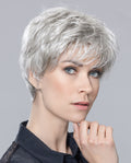 Front view of a woman modeling the elegant Ellen Wille Ziza short wig, showcasing its chic cropped layers, sophisticated texture, and natural volume.