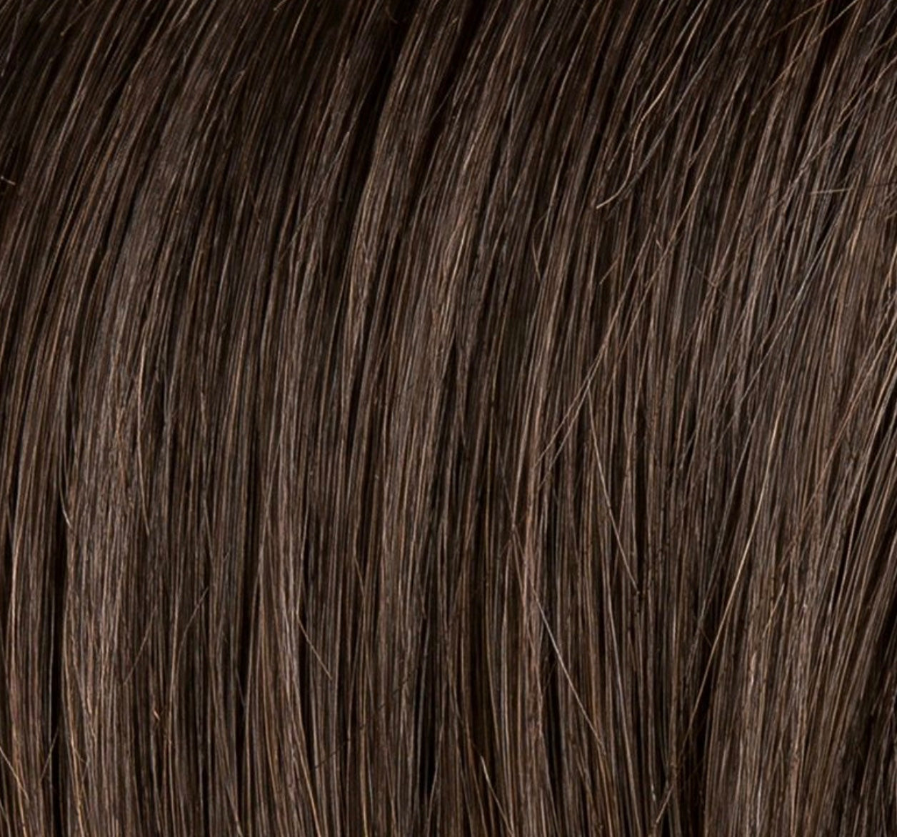 Fantasy Deluxe in Espresso Lighted by Ellen Wille, profile view showing the dark espresso with light tones on the long wig.