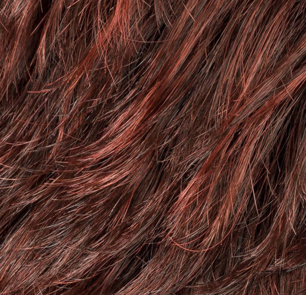 Ellen Wille Keira in Hot Chilli Rooted, side view showing the vibrant copper red tone on the short feathered wig.