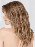 Fantasy Small Deluxe wig by Ellen Wille, lifestyle view showing the long wavy style and heat-resistant synthetic fiber of the Hair Society collection.