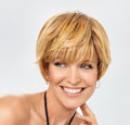 Perruque femme Magic Cut Gisela Mayer, coupe courte et structurée, volume au sommet, frange pleine, fibre synthétique résistante à la chaleur.