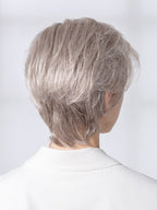 Ellen Wille Satin Soft, three-quarter view showing the short feathered silhouette and feminine natural-looking finish.