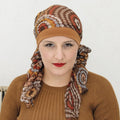 Le turban Ughet, chic et agréable à porter, couvre pelade ou perte de cheveux après chimio avec style et confort.
